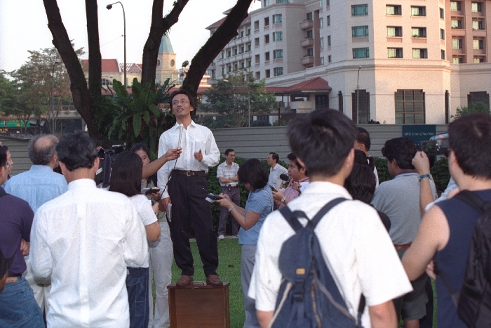 Ong Chin Guan standing on a drawer in Speakers’ Corner. Ministry of Information and the Arts Collection, courtesy of National Archives of Singapore.